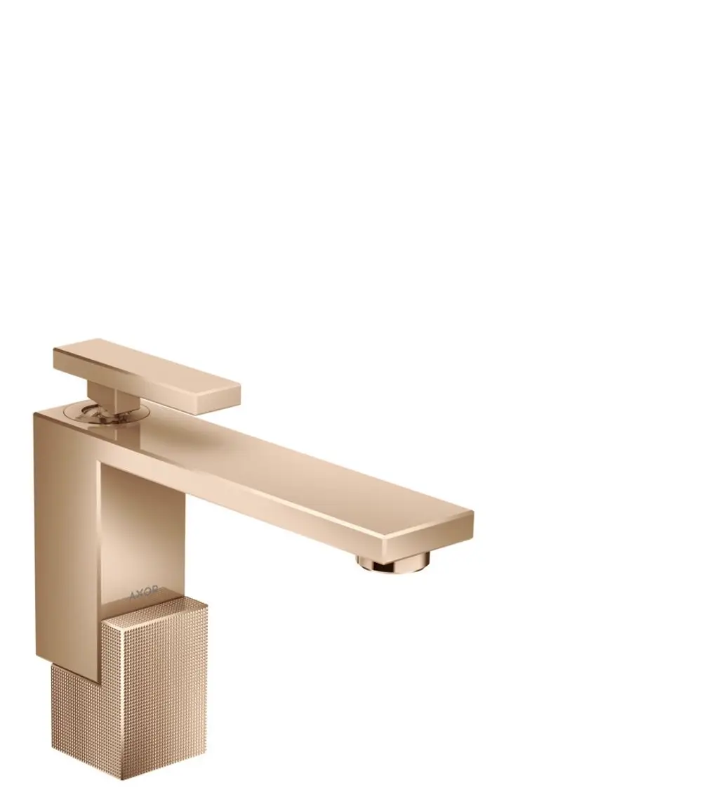 Ein AXOR Waschtischmischer in poliertem Rotgold mit rechteckigem Design und einer Einhebelbedienung. Inklusive Push-Open Ablaufgarnitur.